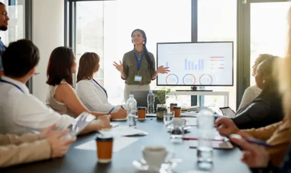 A cropped shot of a young businesswoman giving a presentation in the boardroom