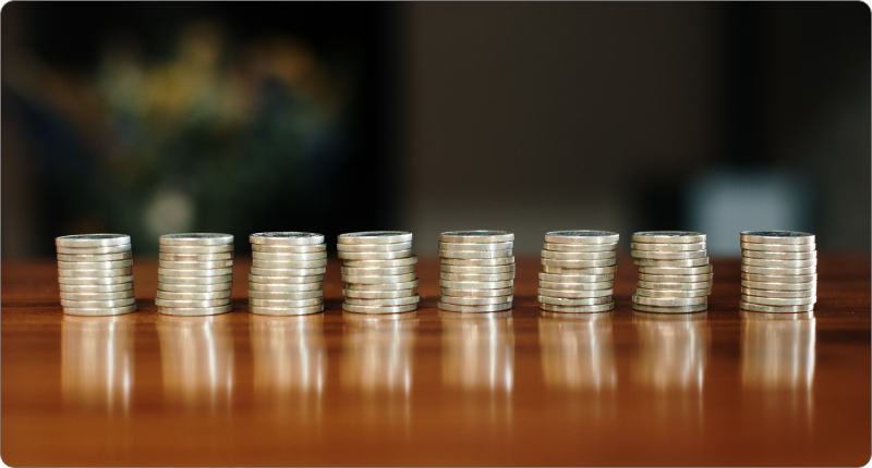 coins stacked equally on a table